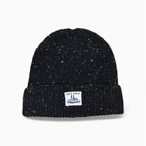 Black knit beanie with a brand label on a white background